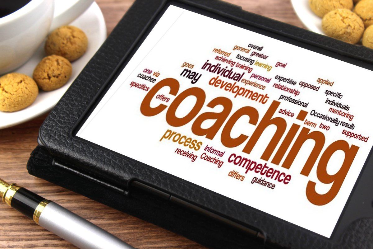 Une tablette sur lequel apparait les differents mots lie au coaching